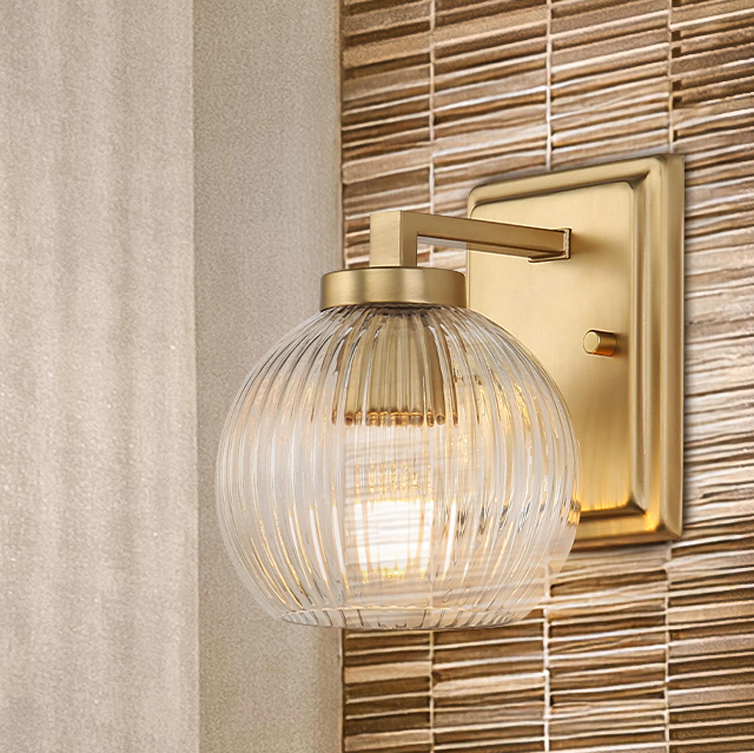 Elliott 1-light Vanity in Brushed Champagne Brass and Clear Ribbed Glass - Image 9